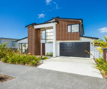 Get set for summer in this spacious family home in Long Bay