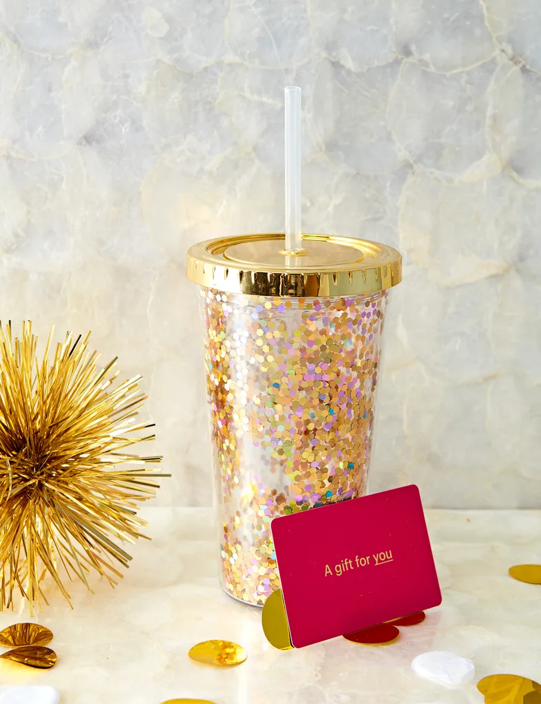 A gift voucher with a glittery smoothie cup.