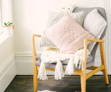 Here’s how to make a DIY cushion cover out of your old jumper