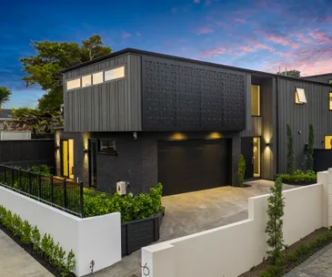 This bold St Heliers home for sale does coastal living in style