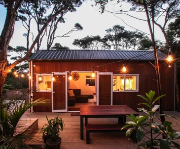 Inside a tiny home on Waiheke where modern design meets cottage style