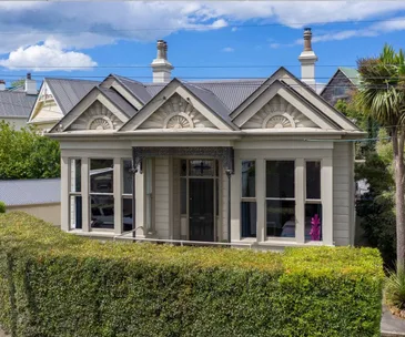 Domestic luxury meets character features in this Dunedin villa for sale