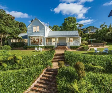 This 1860s Kauri homestead for sale offers peace, privacy and sea views
