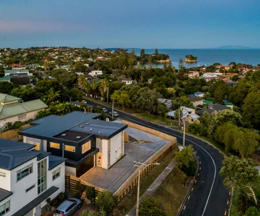Enjoy space, style and distinctive design in this Waiake house for sale