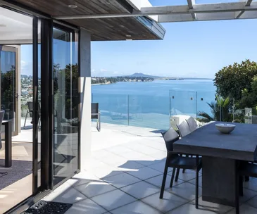 Enjoy spectacular views from every room in this elegant clifftop home