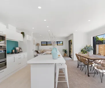 This new Papamoa home is coastal living with the beach in the backyard