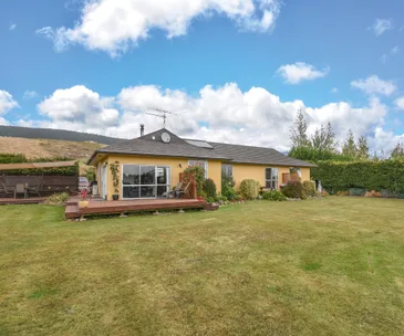 Rural living meets stunning lake views at this Waihola home for sale