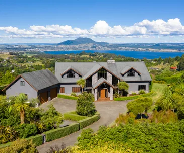 This stunning family home has sweeping views across Lake Taupo