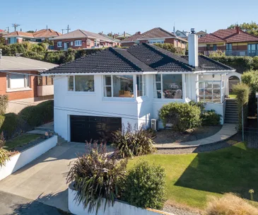 Soak in ocean views at this spacious Dunedin home for sale