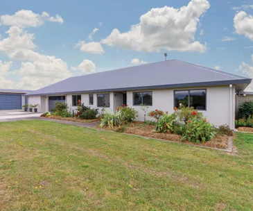 This home offers relaxed country living and the ultimate garage storage