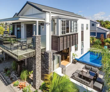 This resort-style home offers sea views and access to coastal walks