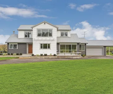 Enjoy the fresh country air at this generous Karaka home for sale