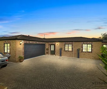 Enjoy cosy family living in this Longford Park drive home for sale