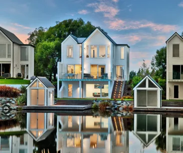 These Clearwater boathouses for sale are stylish lakefront living at its best