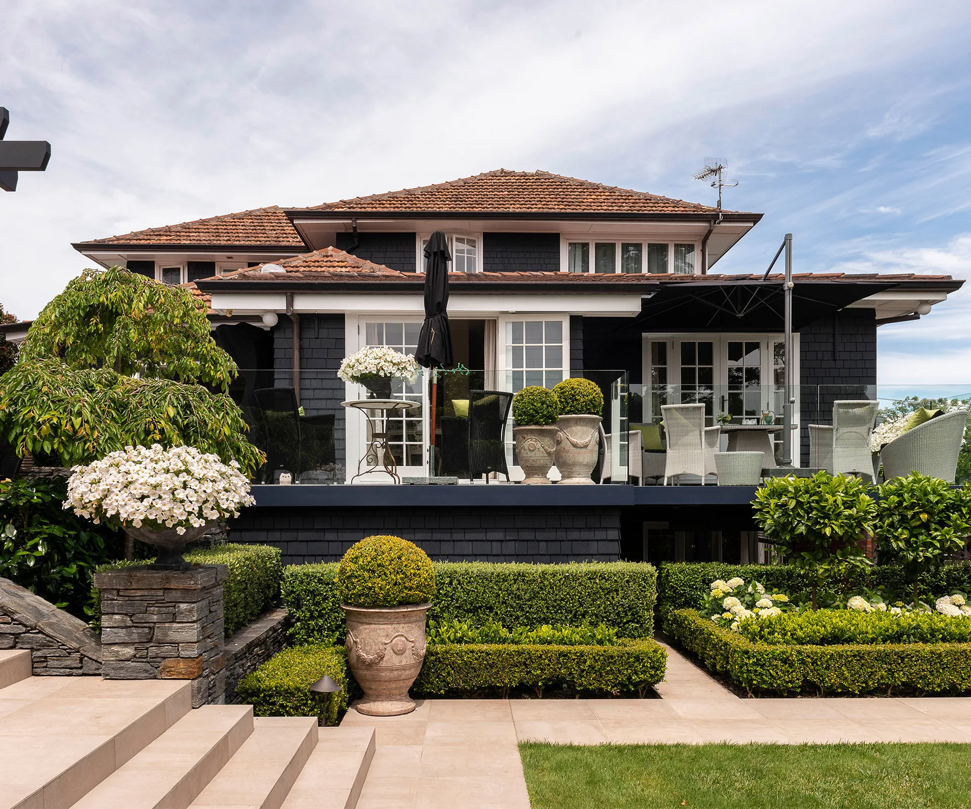 This 1930s home in St Heliers is filled with beautiful antique pieces