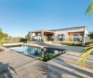 This incredible home for sale will transport you to resort style living
