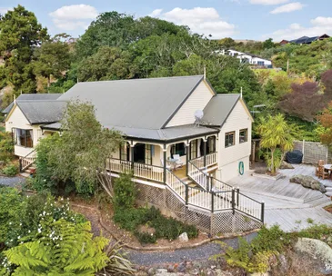 This elegant Drury home for sale has a picture-postcard garden
