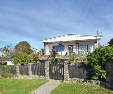 This Brighton home for sale offers a relaxing sunny spot with sea views