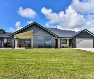 This Karaka home for sale offers sophisticated, private rural living