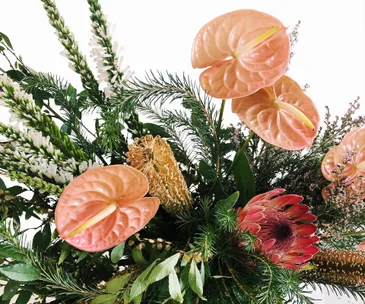 How to create a beautiful flower arrangement with backyard winter blooms