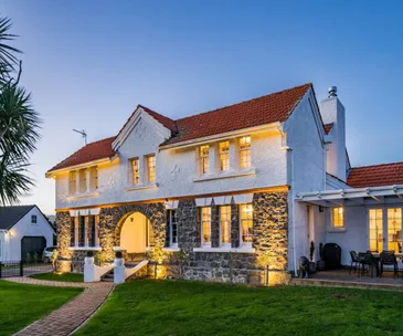 Enjoy fine country style and city convenience in this Plimmerton home