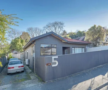 This family home in Stepneyville comes with a big back garden