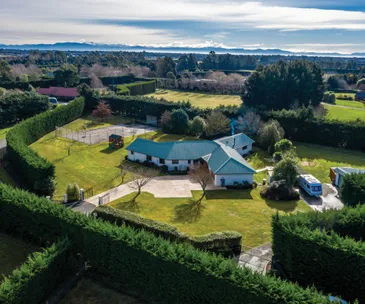 Enjoy enviable country living at this impressive West Melton home for sale