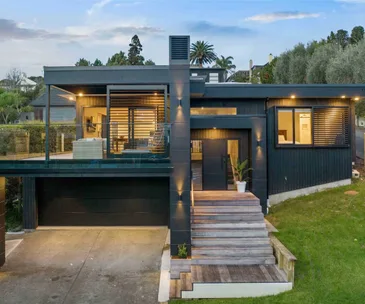Enjoy a designer retreat by the sea at this Castor Bay home for sale