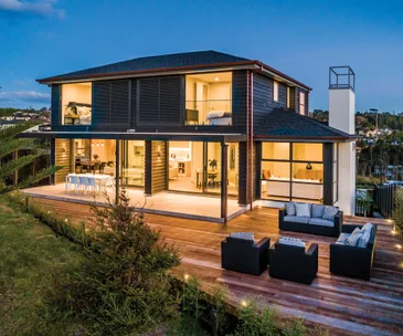 This architecturally designed home comes with views across the golf course