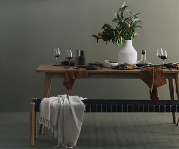 How to create a moody and opulent dining setup perfect for a winter soirée