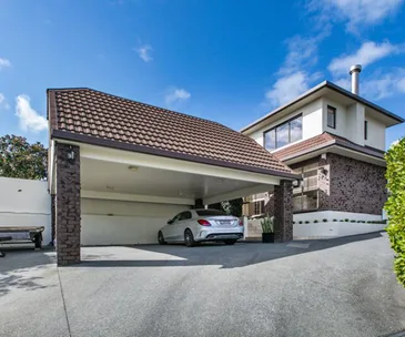 This Eastern Beach home offers spacious living and sweeping sea views