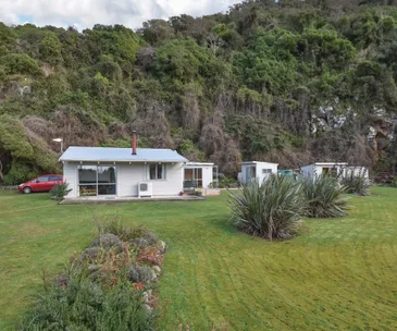 This sweet home for sale in Long Beach has extra income potential