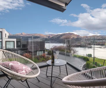 Enjoy lakeside luxury at this modern Queenstown property for sale