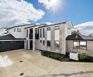 This 5-bedroom home for sale comes with two kitchens