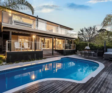 This stylish family retreat in Campbells Bay offers premium outdoor living