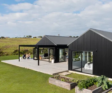 This striking black-clad home has the most restful interior