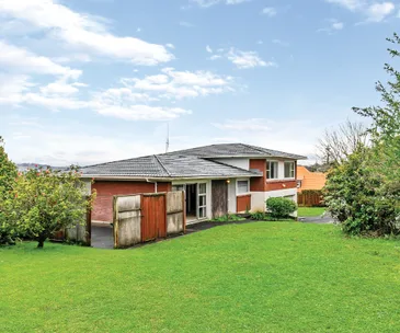 This large property in Sunnyhills is full of development potential