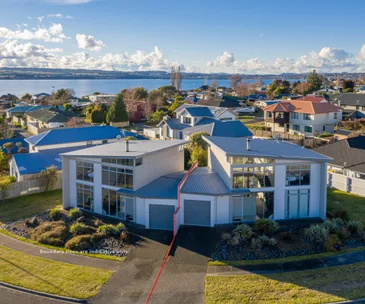These two Taupo homes for sale offer the opportunity for extra income