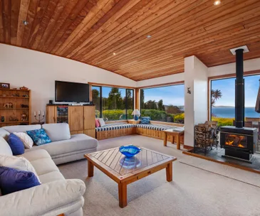This sun-filled Pukawa home enjoys breathtaking views of Lake Taupo