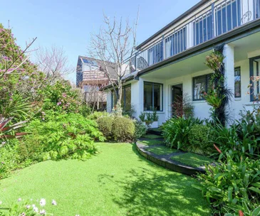 Enjoy functional family living and ocean views at this Eastern Beach home