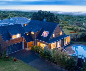 This beachfront home for sale is the ultimate summer spot