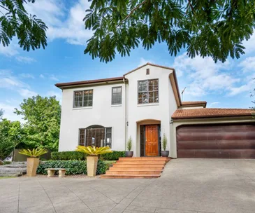 This French Provincial-inspired Beachlands home is perfect for entertaining