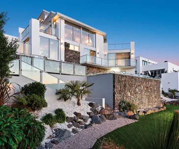 This impressive home comes with incredible views of the city and sea
