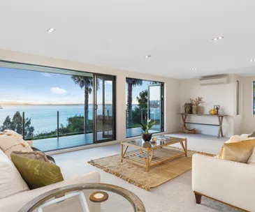 Enjoy breathtaking sea views from this modern Matua apartment for sale