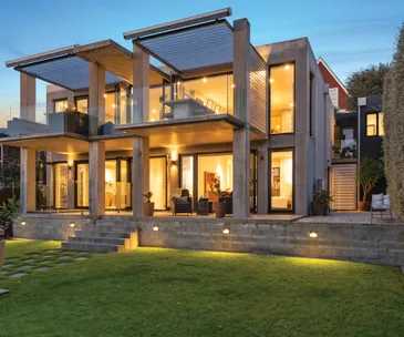 This impressive Takapuna home on Lake Pupuke has its own private jetty