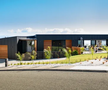 This beautiful Nelson home has 3 decks to capture all-day sun
