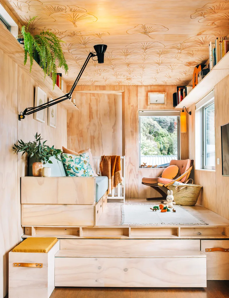 The wooden living room in the shipping container home