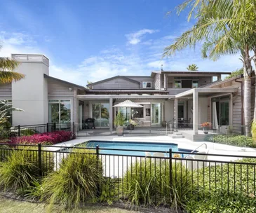 Enjoy resort-style living at this Sunnyhills waterfront estate for sale