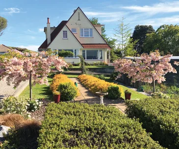 This character-filled Moutere home for sale has a picturesque garden