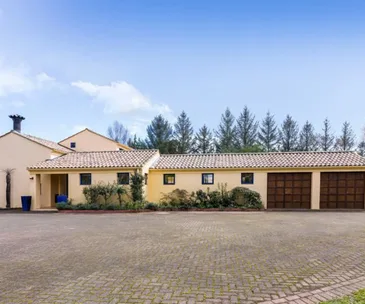 This Mediterranean-style home in Taupo comes with 8 acres of prime land